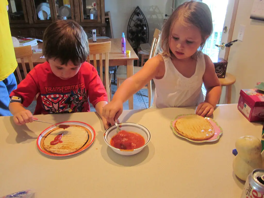 101 Fun Activities to Do with Kids at Home: Host a Make-Your-Own-Pizza Night